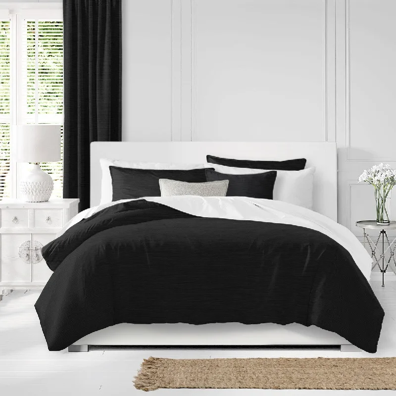 Latex - filled comforters with a bouncy texture and good supportNova Black Comforter & Pillow Sham Set.