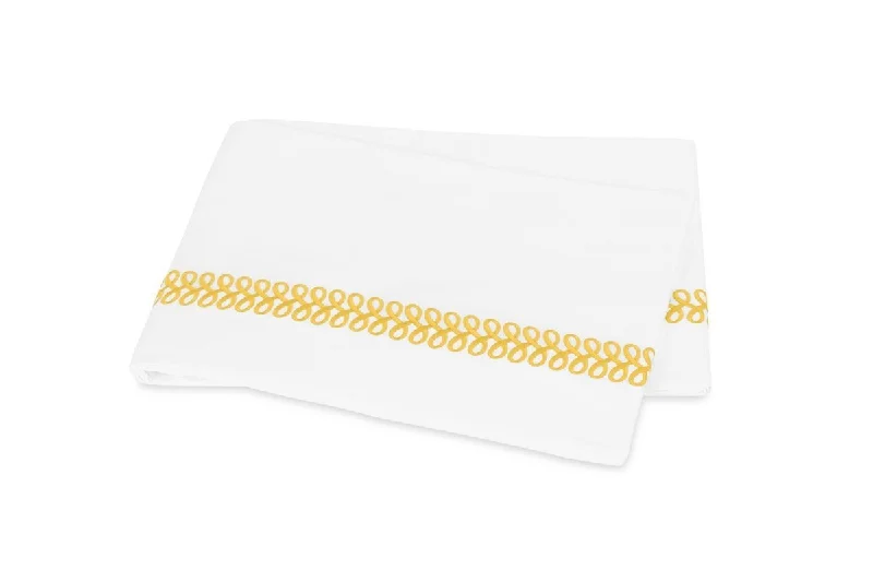 Hotel - quality duvet covers for a luxurious feel at homeAstor Braid Lemon Bedding Matouk Schumacher