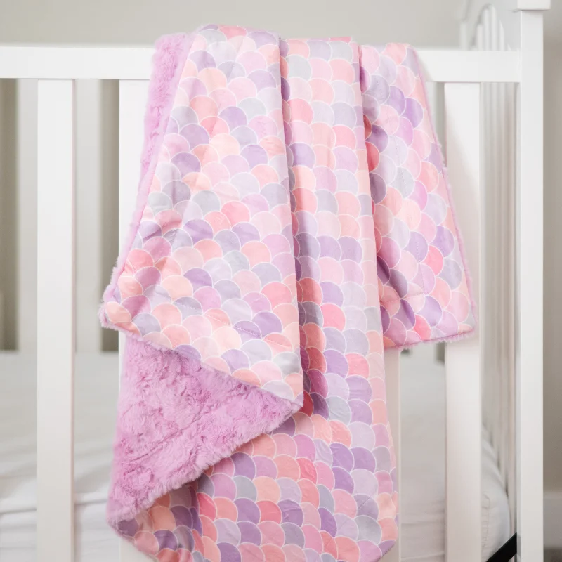 Cotton blankets for breathability and a lightweight feelBlushing Mermaid Baby Blanket