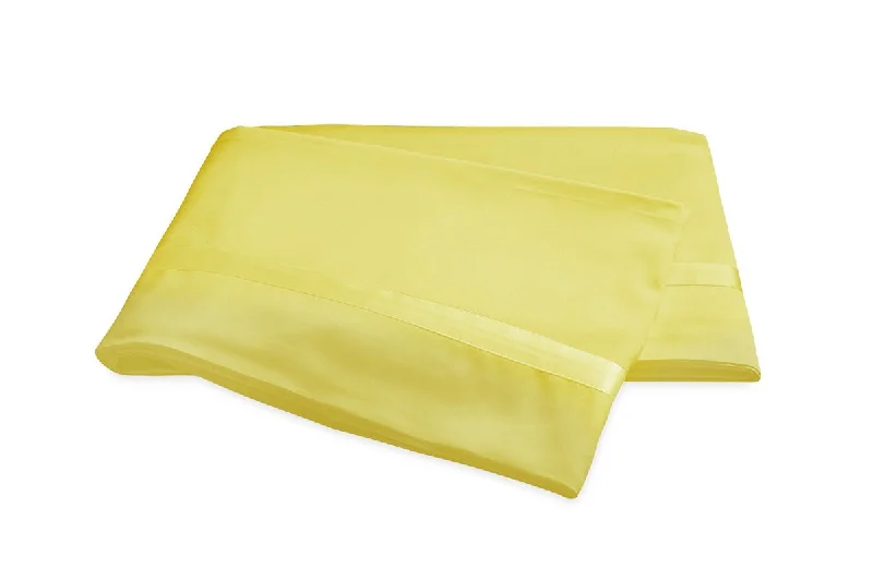 Guest - room duvet covers to make visitors feel welcome and comfortableMatouk Nocturne Sateen Bedding in Lemon Yellow