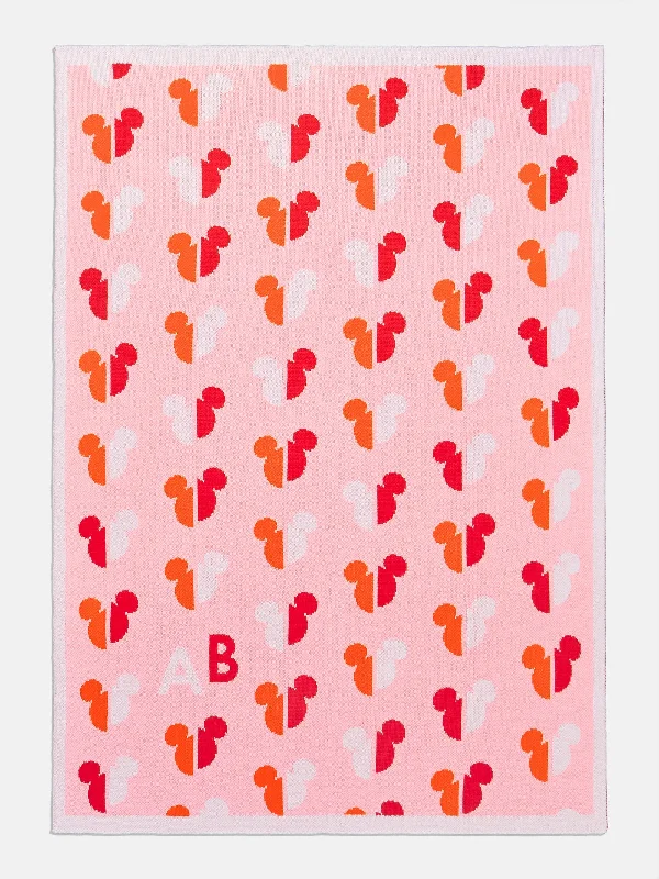 Cotton blankets for breathability and a lightweight feelMickey Mouse Disney Custom Initial Blanket - Pink/Orange