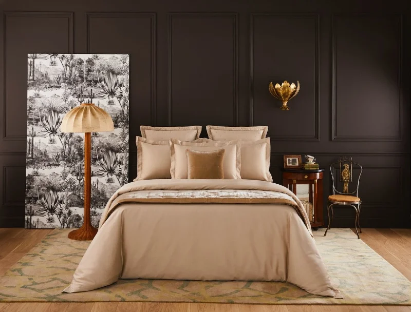 Solid - colored duvet covers in classic colors like white, black, and navy for a timeless lookTriomphe Dune Bedding by Yves Delorme